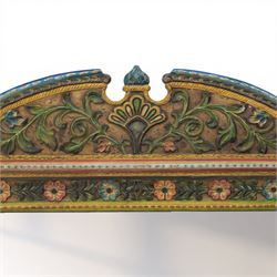 Late 20th century Venetian style polychrome carved wall mirror, arched cresting with central shell motif and scrolling foliate decoration, moulded frame with carved floral borders in relief, enclosing rectangular mirror plate, shaped sides with scroll terminals