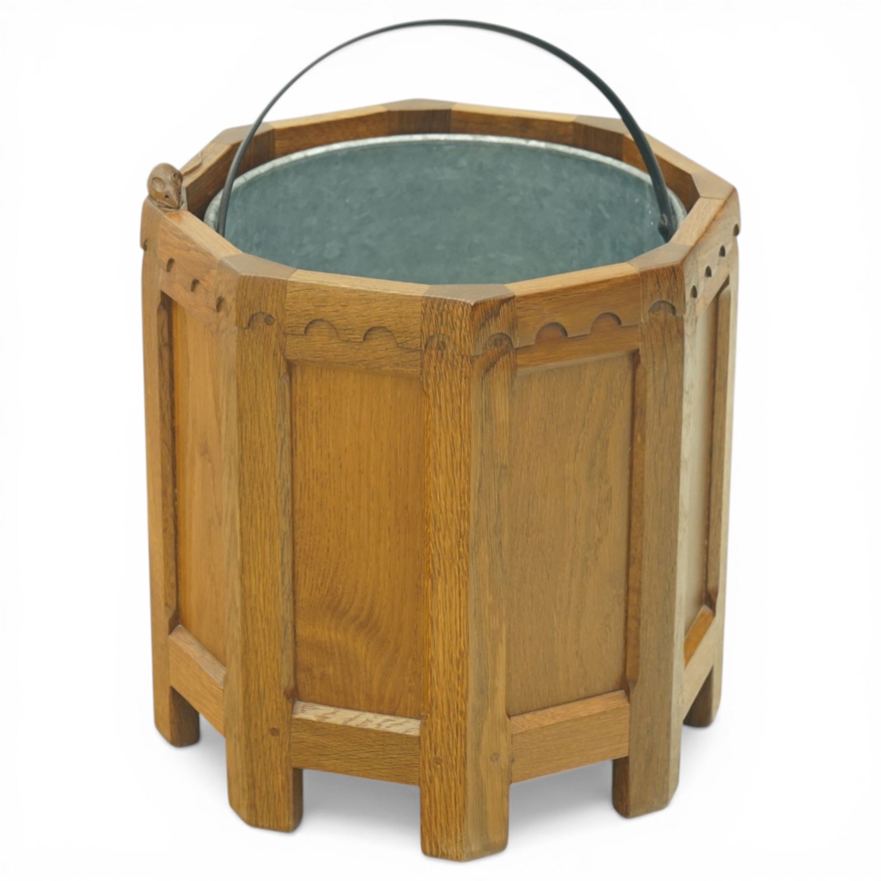 Mouseman - octagonal oak planter or log bin, with contrasting fumed oak panels, penny moulded top, with a cylindrical removable steel bucket, on eight short legs, with carved mouse signature, by the workshop of Robert Thompson of Kilburn, with 1997 original purchase receipt