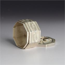 Silver trinket box, of hexagonal form, engraved with entwined snakes to body and decorated to the removable cover with a snake with sapphire set eyes, hallmarked Jonathan Braganza, London 2012, H3cm, W4cm