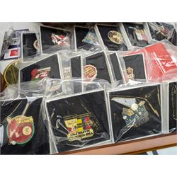 Mostly collectable pin badges and memorabilia, including various L.F.C (Liverpool Football Club) badges produced by the Danbury Mint, various ingots from the 'Golden Games' collection, 'The Battle of Minden', 'The Battle of Waterloo' and other similar pin badges, various display cases, 'Welcome to Paradise' Celtic Park laser crystal numbered 965 and other collectables