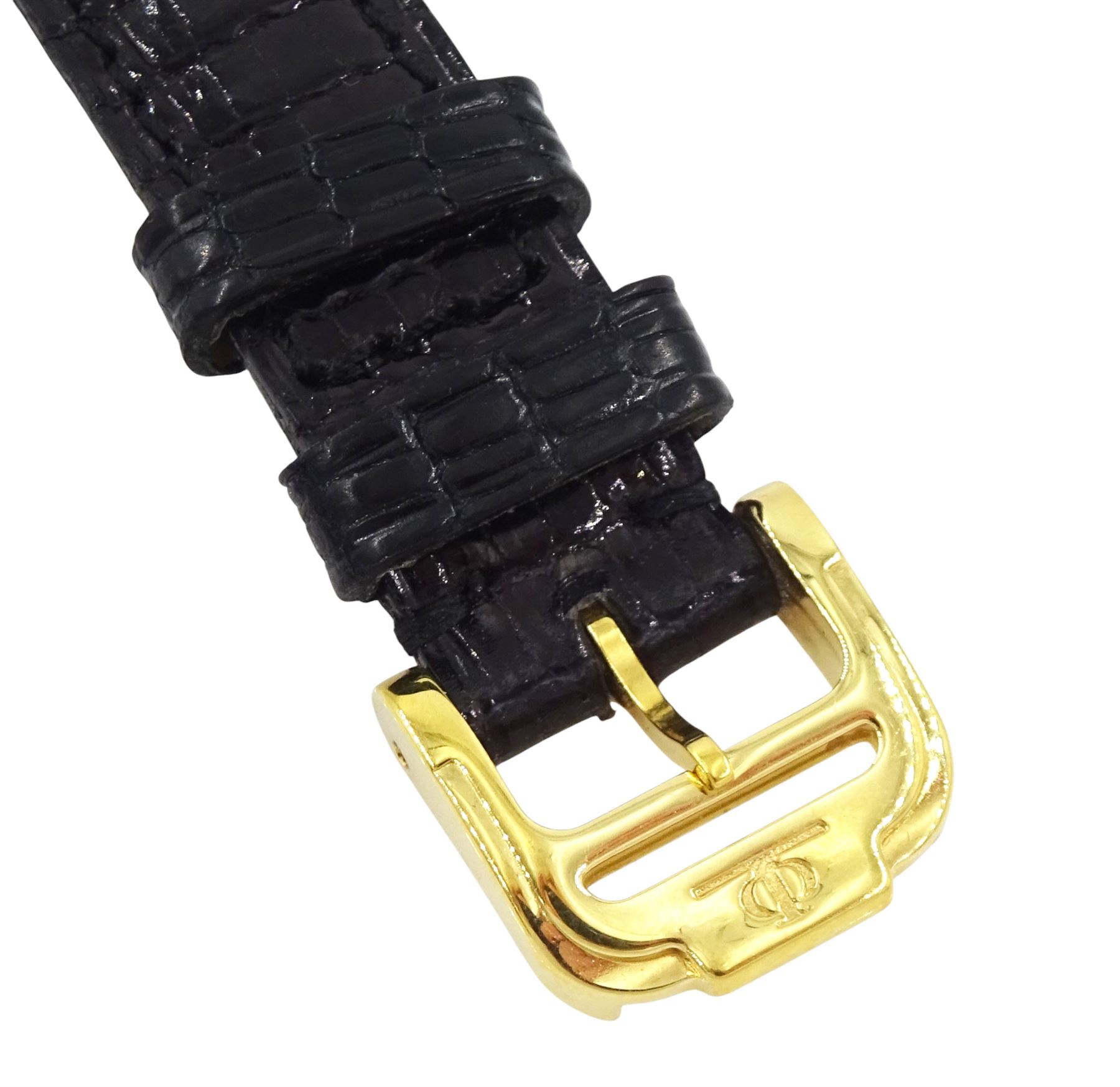 Baume & Mercier ladies 18ct gold quartz wristwatch, champagne dial with baton hour markers, hallmarked, on Baume & Mercier black leather strap, with gilt buckle, with guarantee card dated 1983