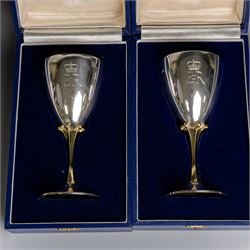 Pair of limited edition commemorative silver goblets, each engraved with HRH Queen Elizabeth's Royal cypher, the bowls with gilt interior and upon a parcel gilt stem, the circular foot engraved 'The Queen's Silver Jubilee 1952-1977', both hallmarked Mappin & Webb Ltd, Sheffield 1977, limited edition numbers 267 & 268/2500, boxed, H17cm