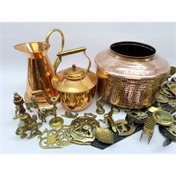 Collection of 20th century horse brasses, three on leather straps, collection of brass miniatures, copper kettle, tapered copper jug with brass handle, dolls part tea set, hand beaten copper and brass jug of Islamic/Middle Eastern origin and other metal wares 