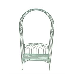 Washed green finish metal garden arbour bench, strap seat, arch trellis top with scrolling and arch decoration