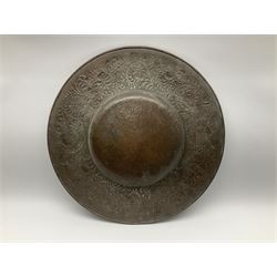 Arts and Crafts Keswick School of Industrial Arts copper charger, decorated with planished centre and repousse scrolling foliate tendrils to rim, D44cm