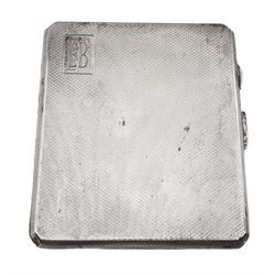 Early 20th century silver cigarette case, of rectangular form with canted corners, engine turned decoration and engraved initials to top corner, hallmarked Frederick Field, Birmingham 1919, together with a pair of 1920's silver napkin rings, hallmarked Adie Brothers Ltd, Birmingham 1924, in velvet and silk lined fitted case, approximate total weight 6.19 ozt (192.4 grams)