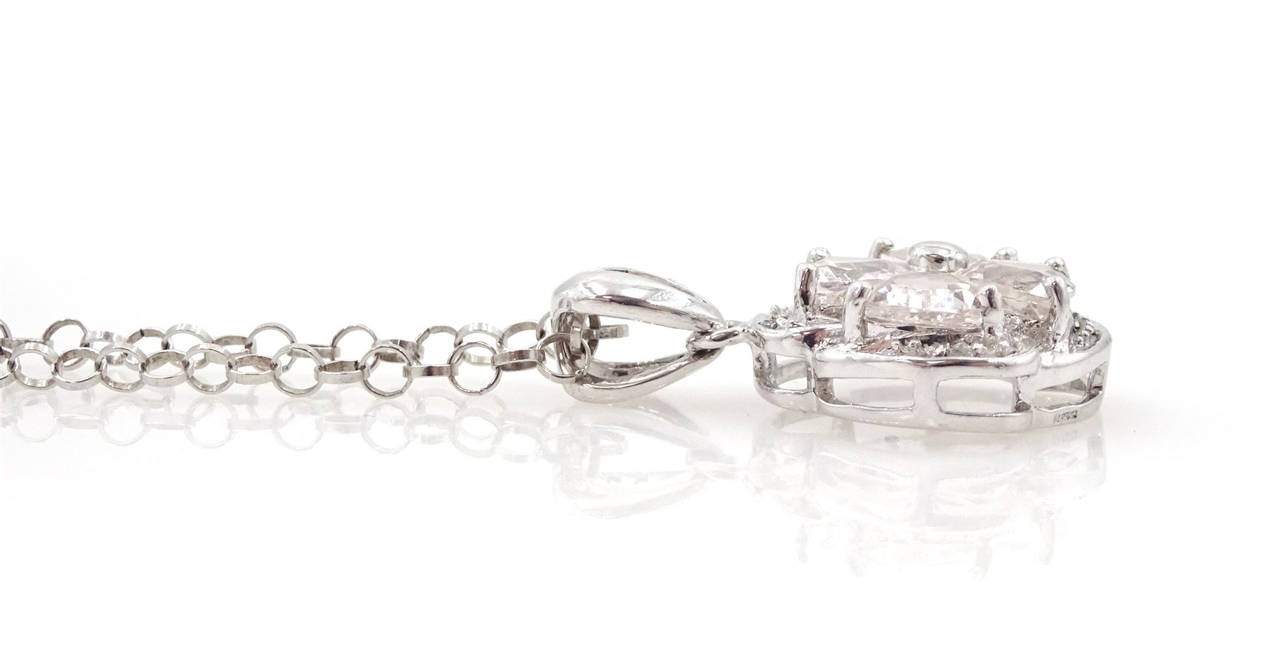 9ct white gold four stone trillion cut morganite and white topaz pendant necklace, total morganite weight approx 1.25 carat