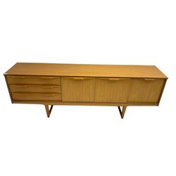 Stonehill Furniture (SF) Ltd - mid-20th century teak sideboard, rectangular topover three drawers, two cupboard doors and fall-front drinks cupboard, raised on square tapering supports