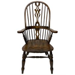 Stained beech Windsor armchair, double hoop and stick back with shaped and pieced splat back, on turned supports united by double swell-turned H stretchers