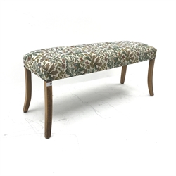 Mid to late century window stool, upholstered in beige ground floral patterned fabric, square tapering outsplayed supports, W114cm, H50cm, D42cm