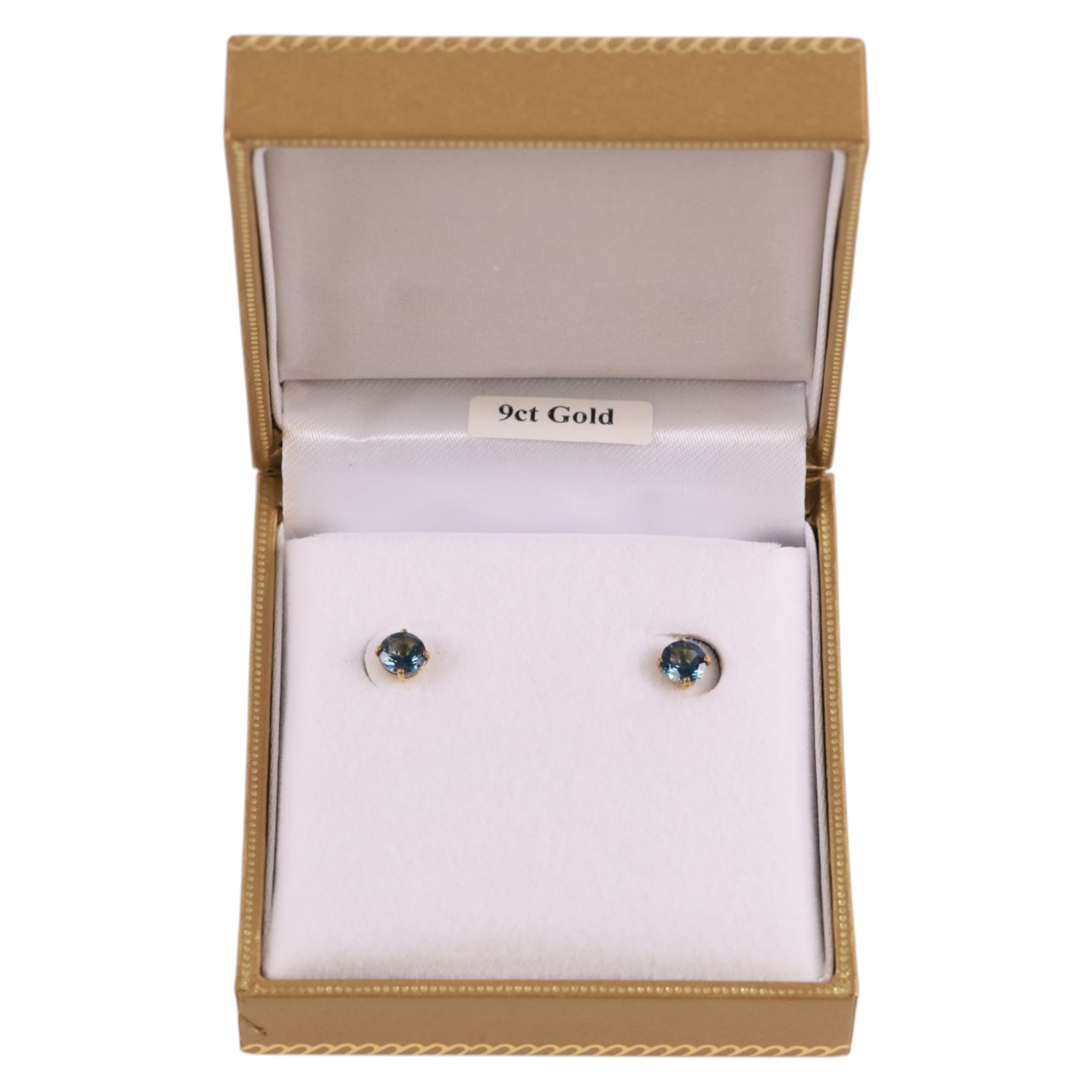 Pair of 9ct gold London blue topaz stud earrings, boxed, D5mm