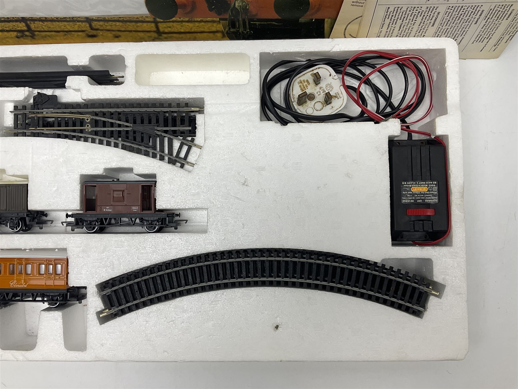 Hornby '00' gauge - Thomas The Tank Engine Series Gordon Passenger Electric Train Set with 4-6-2 locomotive No.4, tender, three coaches, accessories and original 1987 purchase receipt; together with Thomas the Tank Engine Electric Train Set with 0-6-0 tank locomotive No.1, two coaches, three wagons and accessories; both boxed (2)