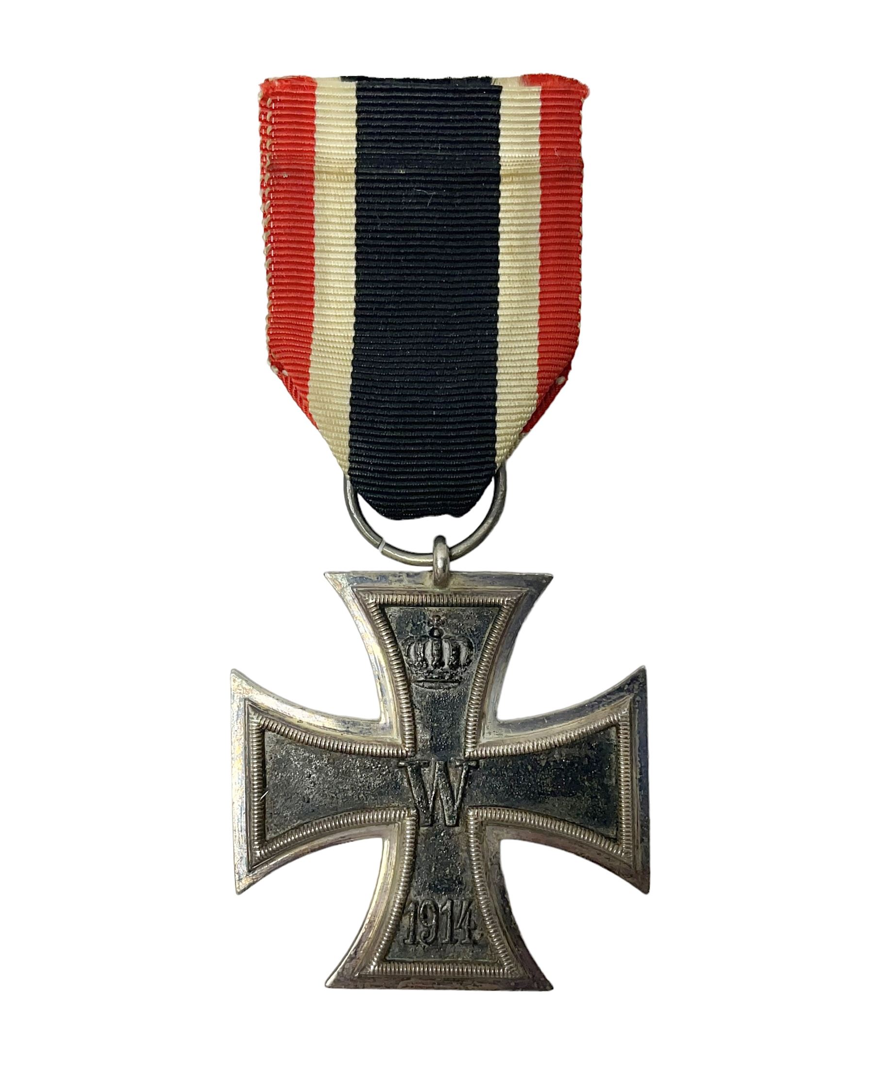 WWI Imperial German Iron Cross 2nd Class, the suspension ring indistinctly stamped M8?; with WWII ribbon