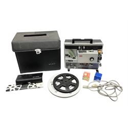 Elmo ST-1200 sound film projector, with instruction manual and black carrying case