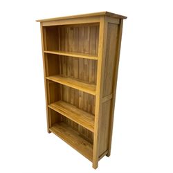 Light oak bookcase with three adjustable shelves