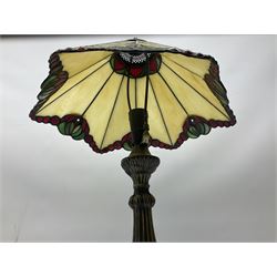 Tiffany style table lamp, with cast bronzed effect base with leaded and coloured glass effect shade, H66cm