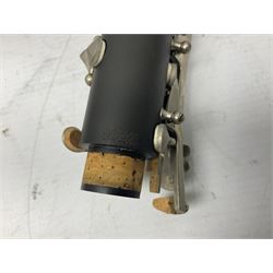 Windsor five-piece clarinet, serial no.EK05580; and Selmer Console clarinet with B&H mouth-piece; both cased (2)