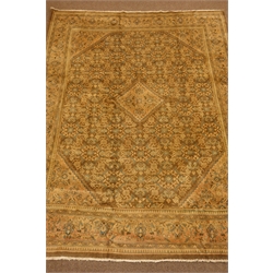  Large Persian carpet, stepped lozenge medallion and spandrels, decorated with Herati motifs, 400cm x 300cm  