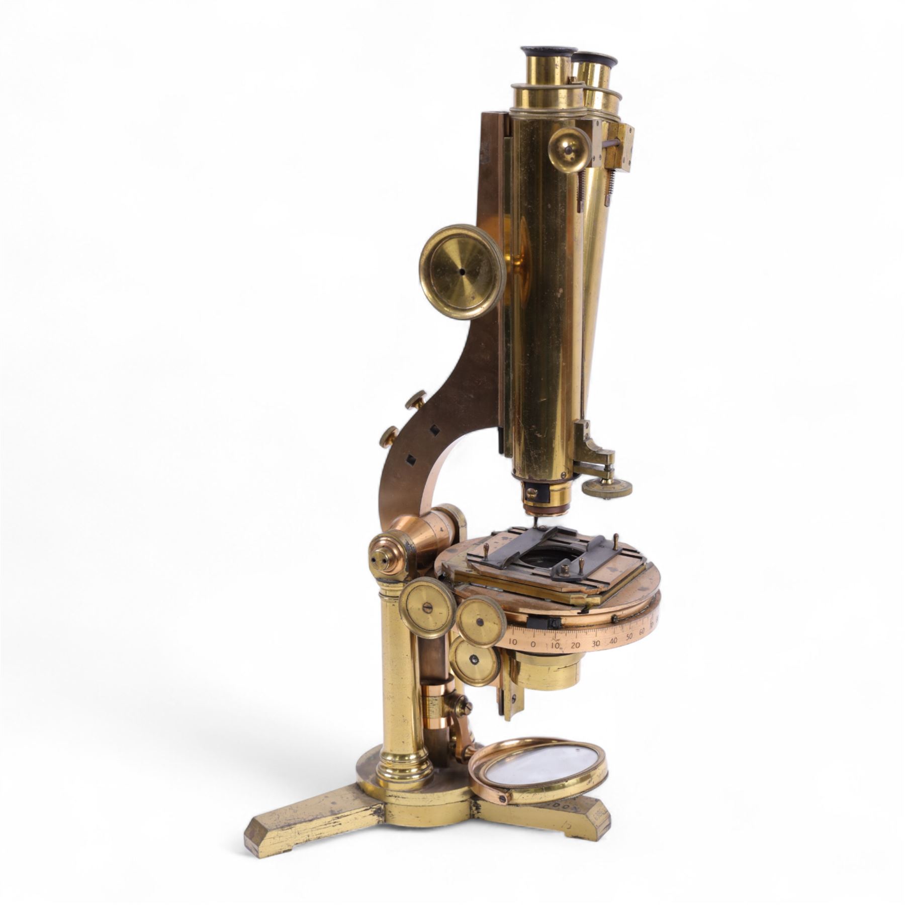 19th century brass binocular microscope by R&J Beck, 31 Cornhill London, numbered 6386, with rack and pinion focusing, housed in wooden case with case of accessories, including eyepieces, objective lenses and condenser