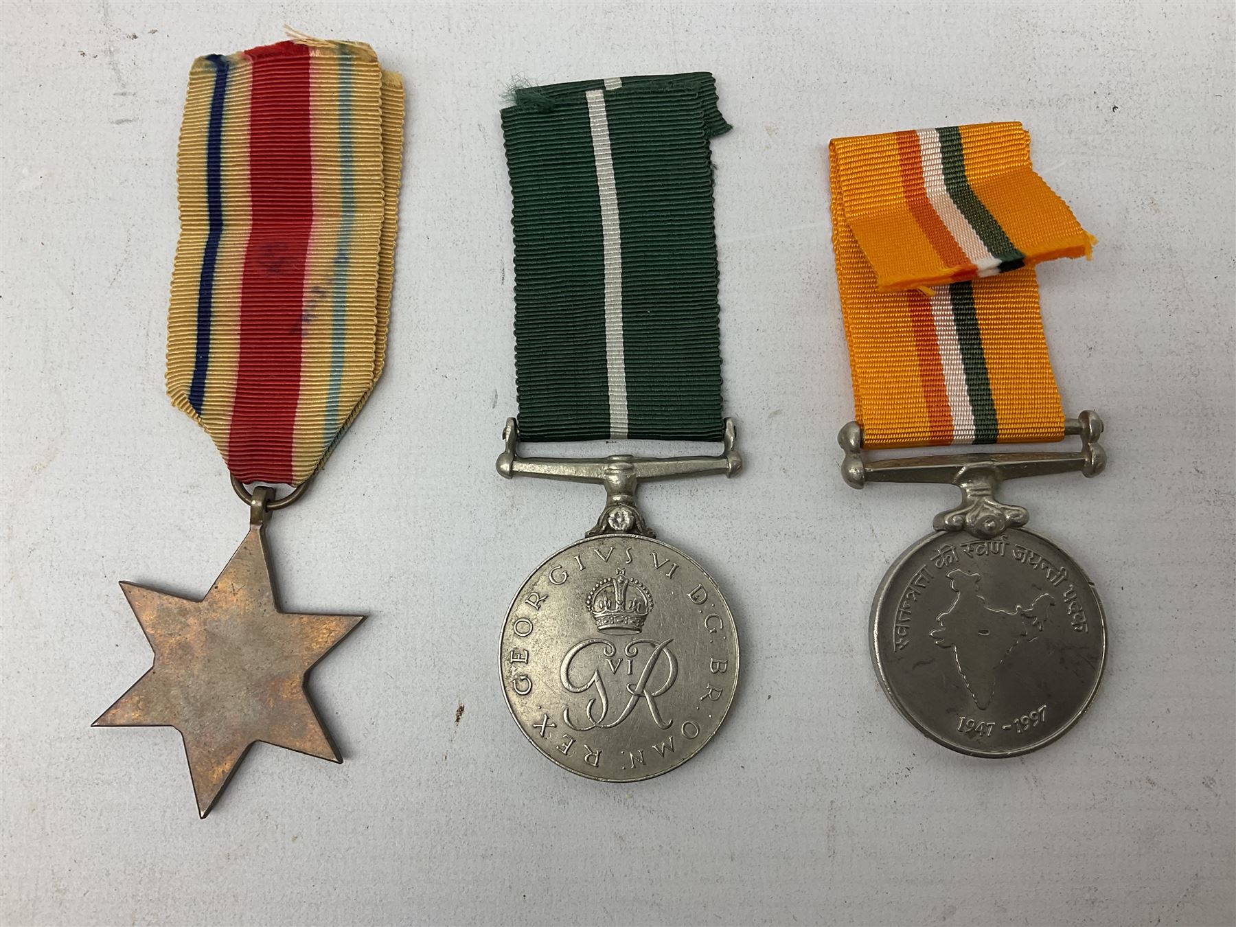 QEII General Service Medal awarded to 23504634 CFN. R.G. Beech REME; Pakistan Independence Medal awarded to Nadir Khan F.C.330; India Independence 50th anniversary medal; and a quantity of WW2 and later medals including Territorial Efficiency Medal awarded to 6196646 Gnr. J.G. Oatway R.A. (13)
