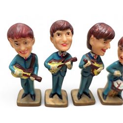 Set of four The Beatles plastic nodding / bobble head figures, H10cm