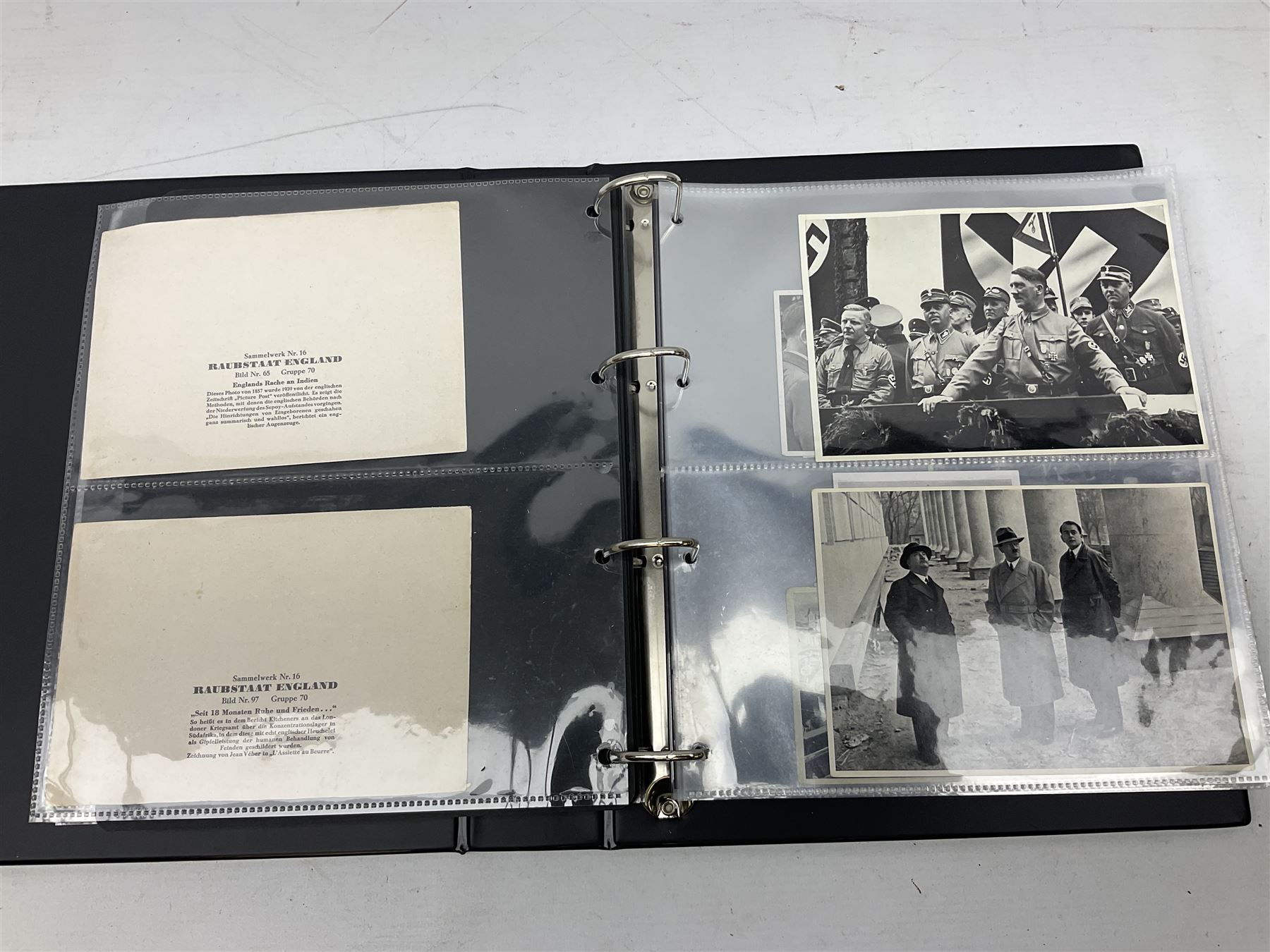 Modern loose leaf album of WW2 German postcards, photographs and other paper ephemera including Adolf Hitler, Luftwaffe, comic, soldier and group portraits, memorial cards, propaganda images, interesting postmarks etc