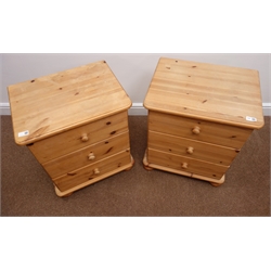  Pair solid pine bedside chests, three drawers, bun feet, W51cm, H62cm, D38cm  