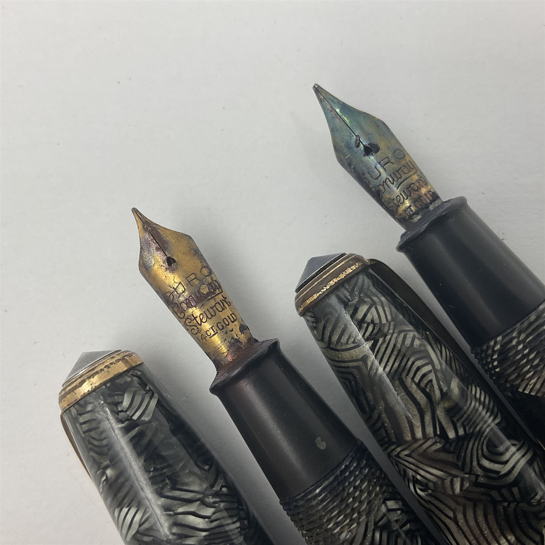 Conway Stewart Executive 60 fountain pen, the barrel and cap with hatched grey and black marble decoration and gold nib stamped Duro 14ct, together with a Conway Stewart 58 fountain pen similarly decorated in pearl blue and black with gold nib stamped 14ct, largest 13cm (2)