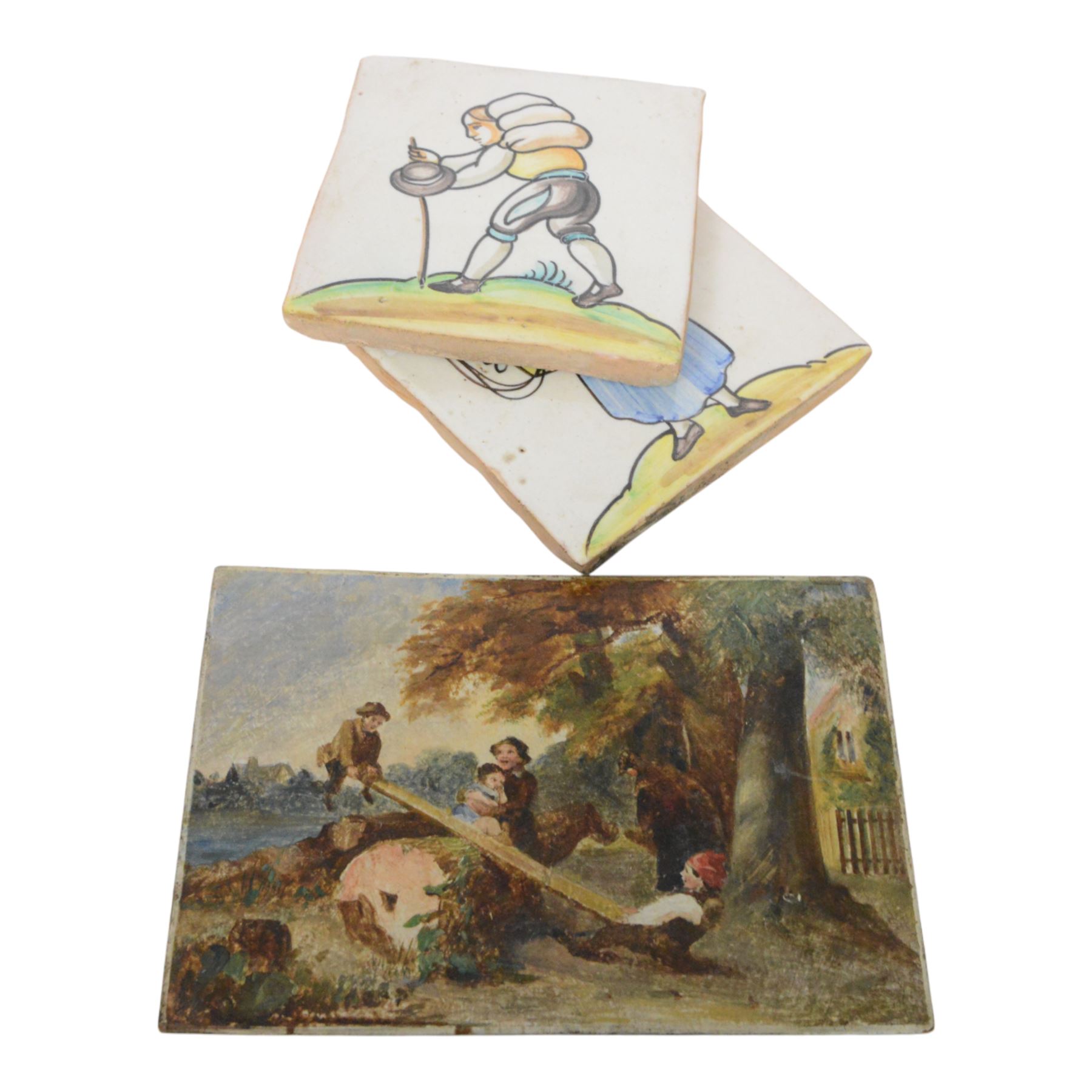 Pair of 20th century continental tin glazed tiles, of a man and a woman in traditional dress, H15cm, together with a Baby Cine Camera in case, flute parts, and Continental oil on board