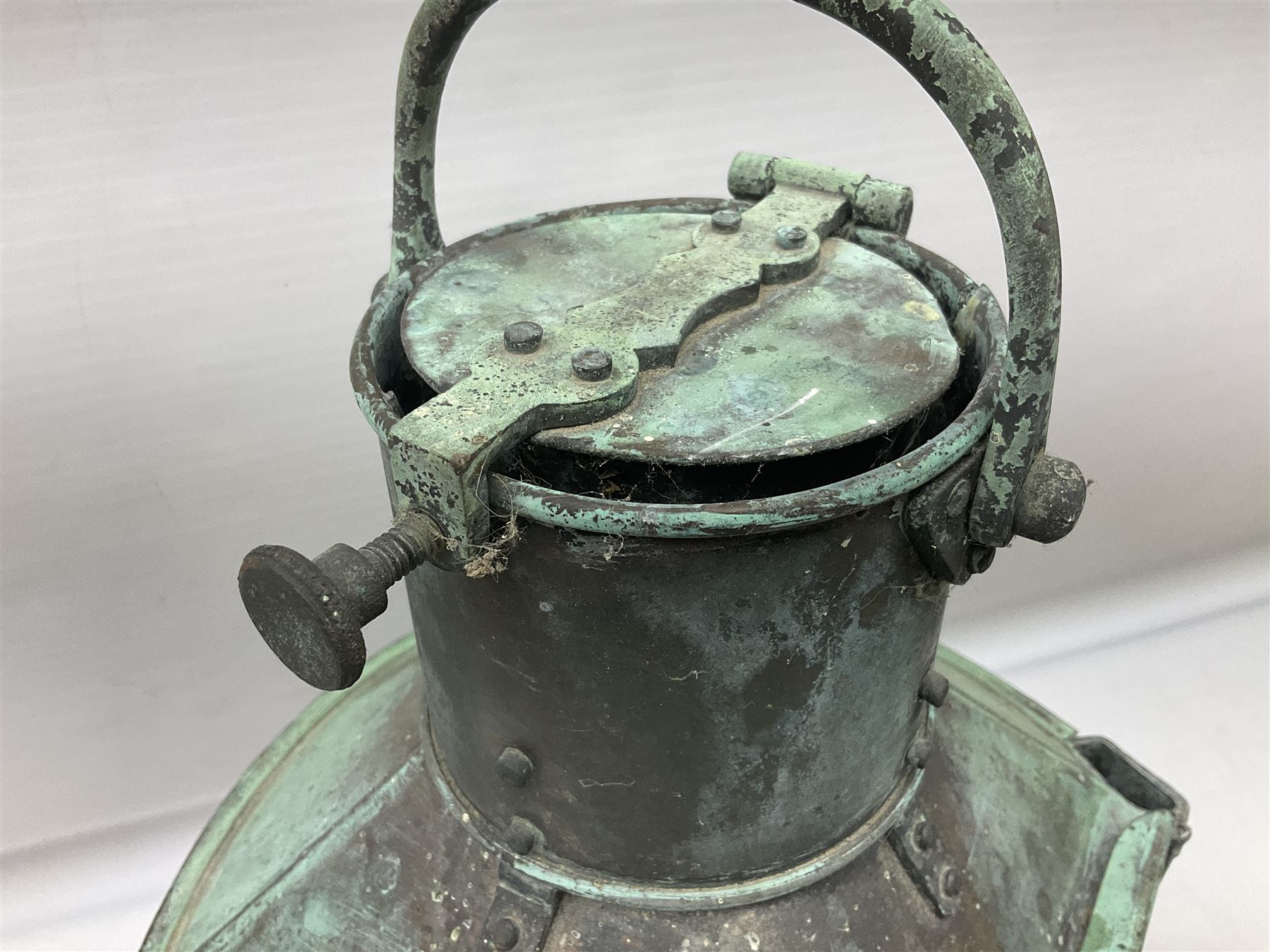 20th century Alderson & Gyde Ltd copper ship lantern, with swing handle and a plaque inscribed Bow Port Patt 23 and ribbed clear glass shade