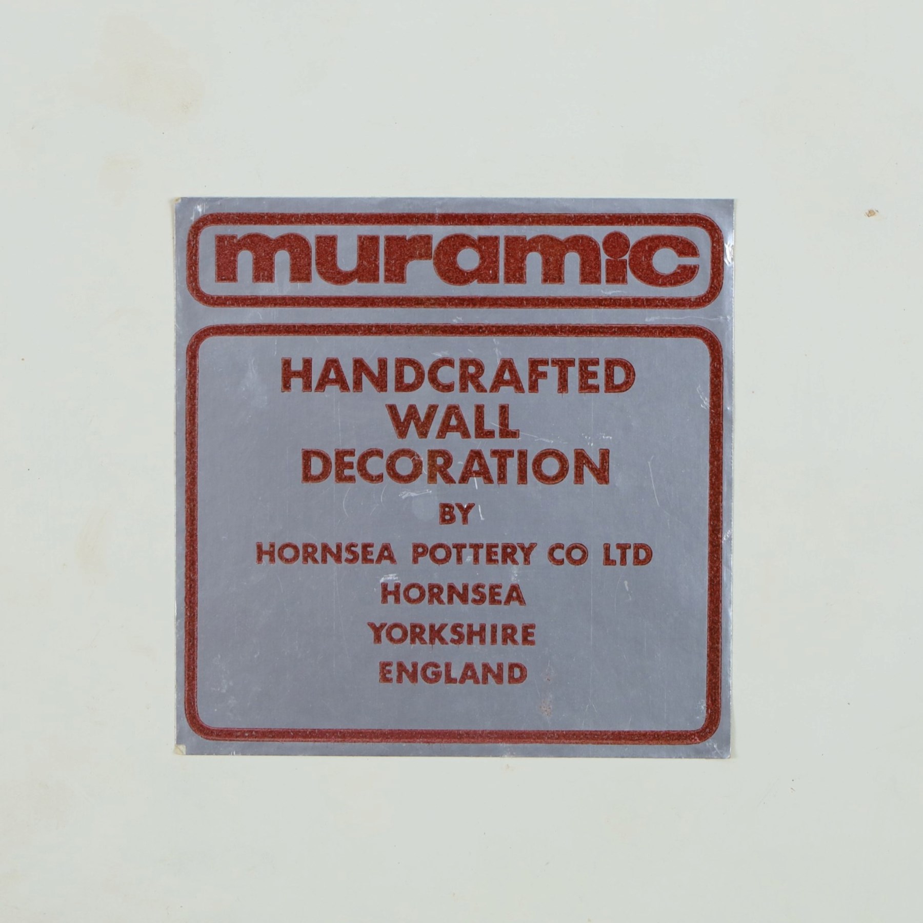 Two 1960's Hornsea pottery Muramic plaques designed by John Clappison, comprising framed example in the form a stylised figure of a lady and an unframed example in the form of a bird, H45cm