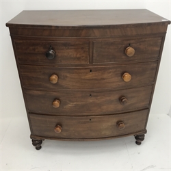 Victorian mahogany bow front chest, two short and three long drawers, turned supports, W105cm, H116cm, D54cm