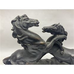 Bronzed figure group of two rearing horses, on naturalistic base and mounted on a stepped plinth, H38cm