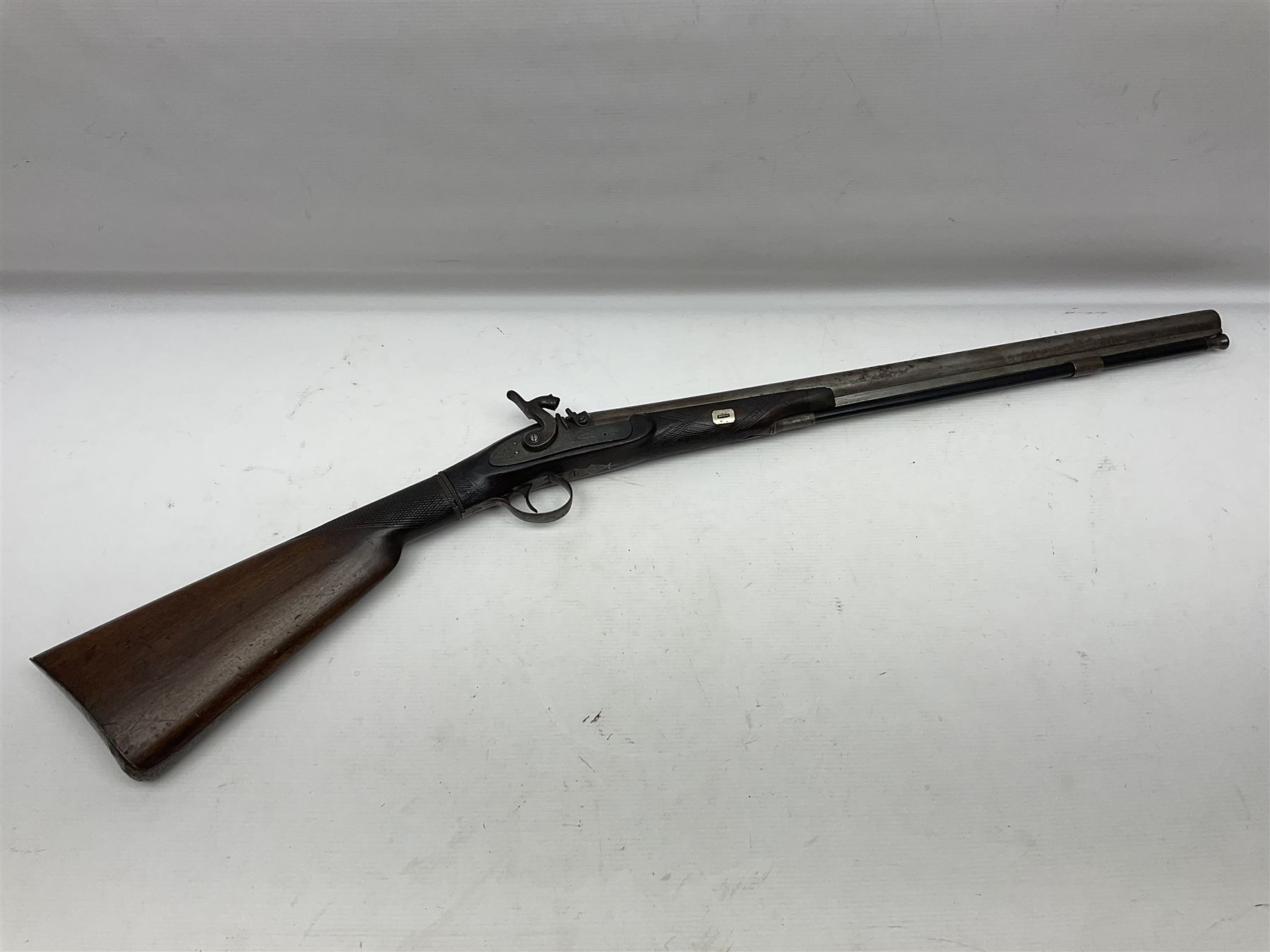 19th century take down 'cripple stopper' single barrel percussion gun, removable walnut stock with bayonet style fitting, chequered grip and fore-end, approximately 8-bore, the 59.5cm (23
