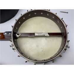Five-string banjo by Clifford Essex Co. 15A Grafton Street, Bond Street, London W, with mother-of-pearl inlaid ebony fingerboard L92cm; in carrying case with strap
