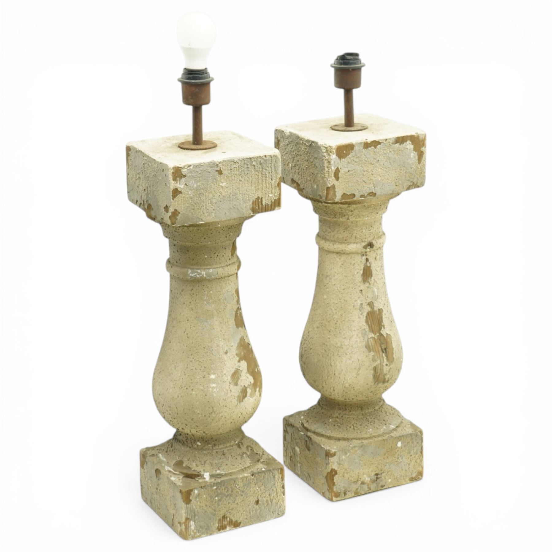 Pair of late 20th century pine table lamps, each of architectural column form, with square capital over turned baluster support and plinth base, distressed stone effect painted finish