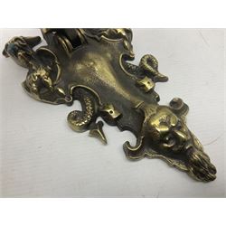 Gothic style cast brass door knocker, modelled with the Greek three-headed hell hound Cerberus on Rococo style base with central knocker of tear drop above Hades, God of the underworld, L29cm