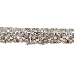  White gold diamond flower design line bracelet stamped 18K, total diamond weight 10.00 carat  