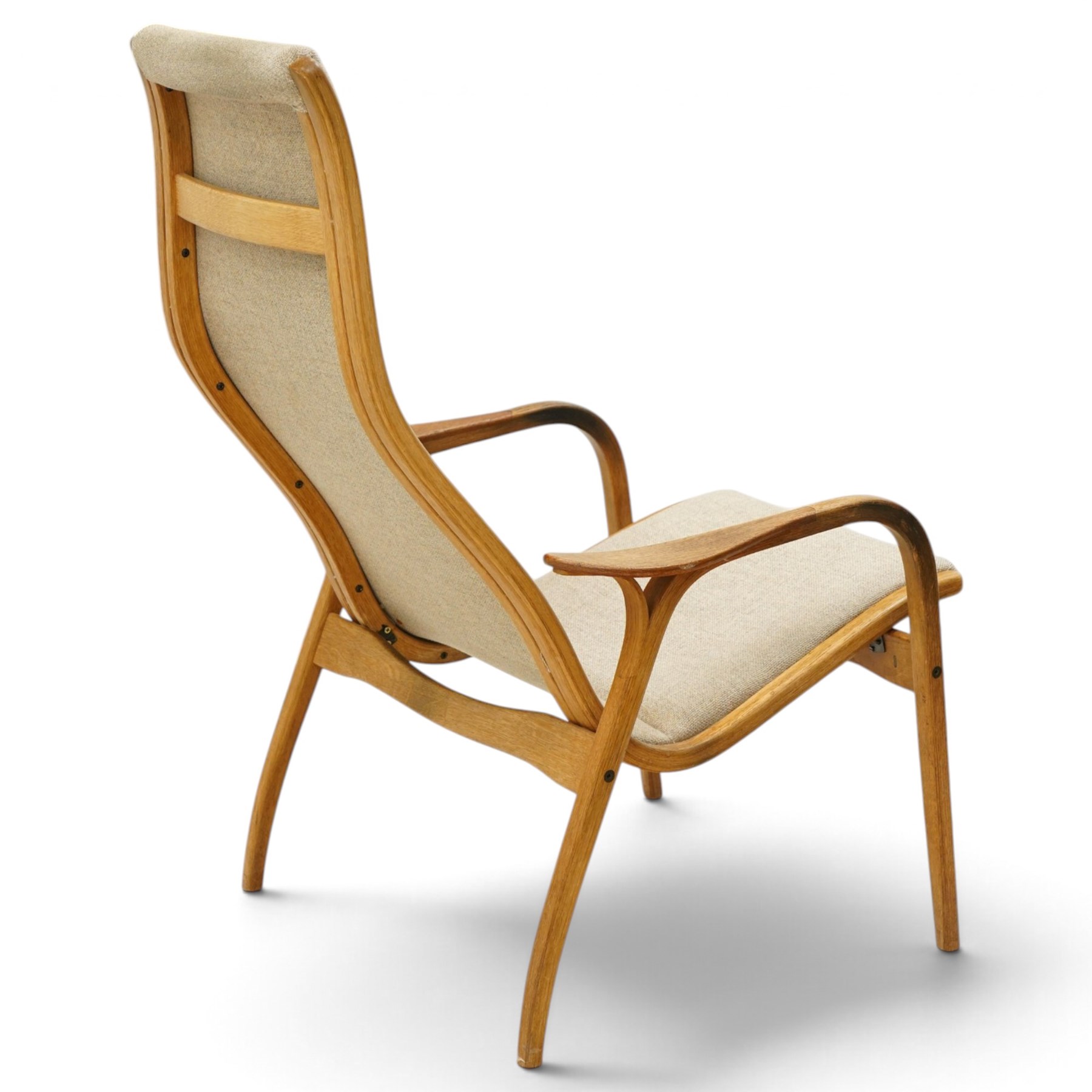 Yngve Ekström (1913-1988) for Swedese - pair of 'Lamino' bent-oak framed easy armchairs, the high reclined back over shaped swept arms and splayed supports, upholstered in beige fabric