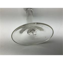 18th century drinking glass, the bell shaped bowl raised upon a plain stem with internal tear and conical foot, H16.5cm
