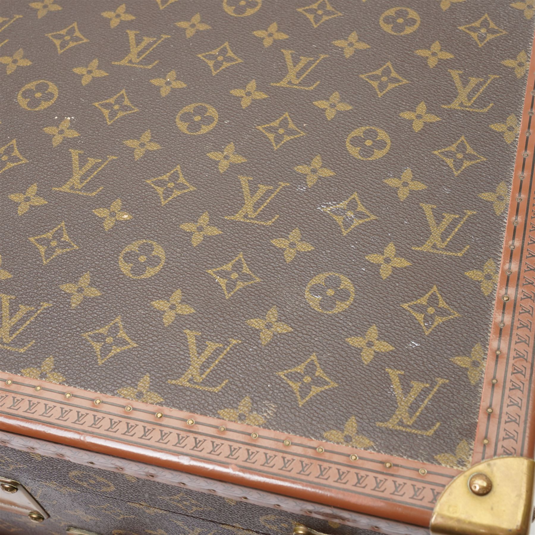 Mid-20th century Louis Vuitton monogram cabin trunk,  monogram canvas with lozine trim and brass mounts, single front leather handle with lock stamped Louis Vuitton with matching key code 1080701, the interior fitted with original webbing straps and lift-out tray, circa1960s, with original key present
