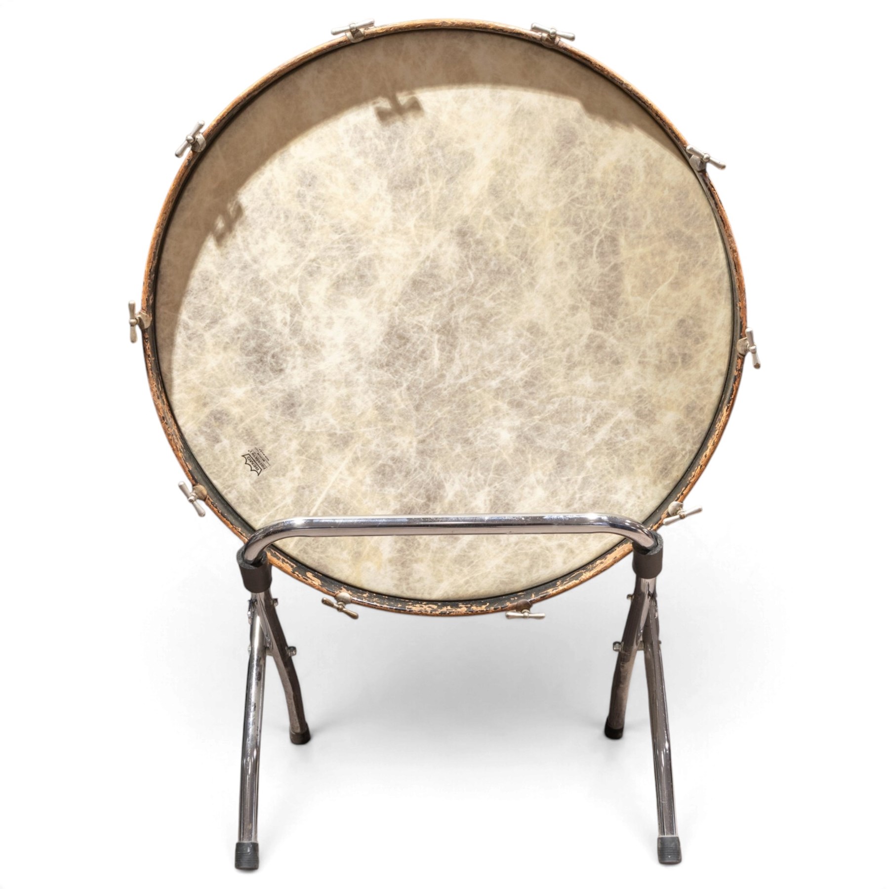1930s Carlton Standard large concert bass drum, with Remo Fiberskyn 2 head, wooden shell and metal tension rods, on chrome cradle stand, with black hard carry case, D69cm