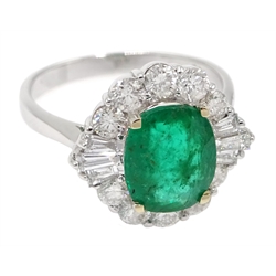 18ct white gold oval emerald, round and baguette cut diamond ring, stamped 750, emerald approx 1.90 carat