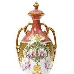 Early 20th century Royal Crown Derby vase and cover, of slender form, the pompadour pink ground with gilt decoration, painted centrally with a tree, printed marks to base, H25cm 