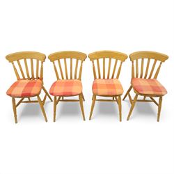 Late 20th century pine farmhouse dining table, rectangular top raised on turned legs, together with a set of matching spindle-back chairs with padded seats