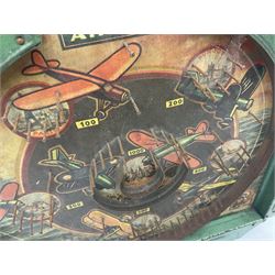 1934 Lindstrom's 'Airways' tin-plate bagatelle game by Lindstrom Tool and Toy Company Bridgeport Conn., the decorative bagatelle board depicting Lindstrom's epic airway routes; with wooden peg and quantity of balls H61cm