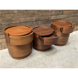 Three walnut circular barrel shaped lamp tables, fitted with single drawer (lower table D53cm, H49cm)