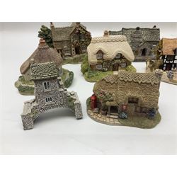Seventeen Lilliput Lane models, to include The Dalesman, Windy Ridge, Cat Coombe Cottage, Granny Smiths, ect, all with deeds and original boxes (17)