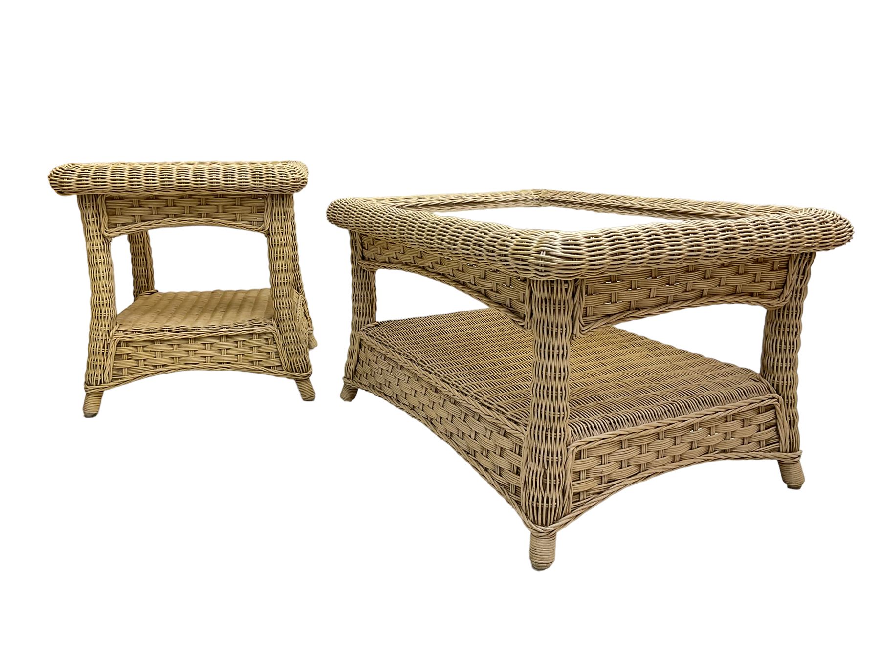 Contemporary rattan conservatory suite - two seat sofa with wicker frame and loose cushions upholstered in textured champagne fabric (W125cm H98cm); pair of matching armchairs (W72cm H98cm); rectangular glass-topped coffee table with rattan frame and undertier (W85cm D60cm H47cm); and matching square side table (W53cm H55cm)