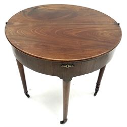 Georgian mahogany demi-lune folding table, turned tapering supports 